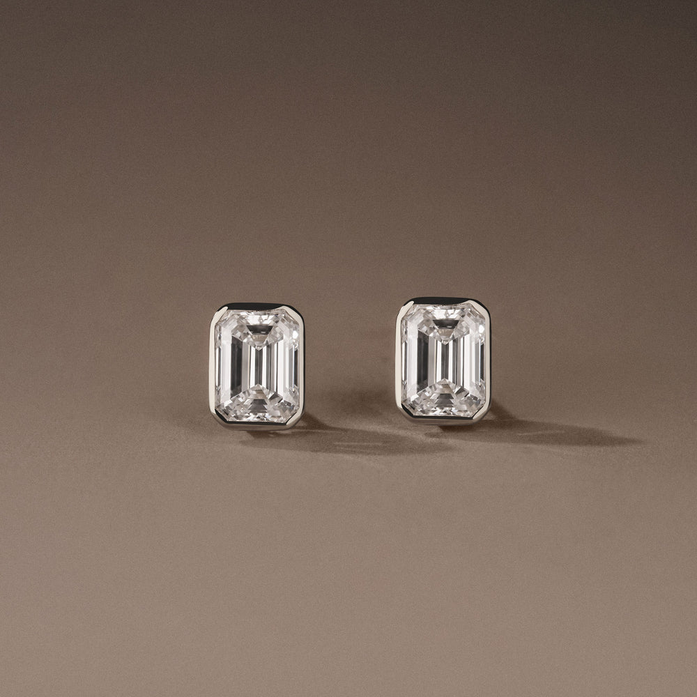 Bezel Set 3.00ct Emerald Cut Lab Diamond Stud Earrings in Platinum
