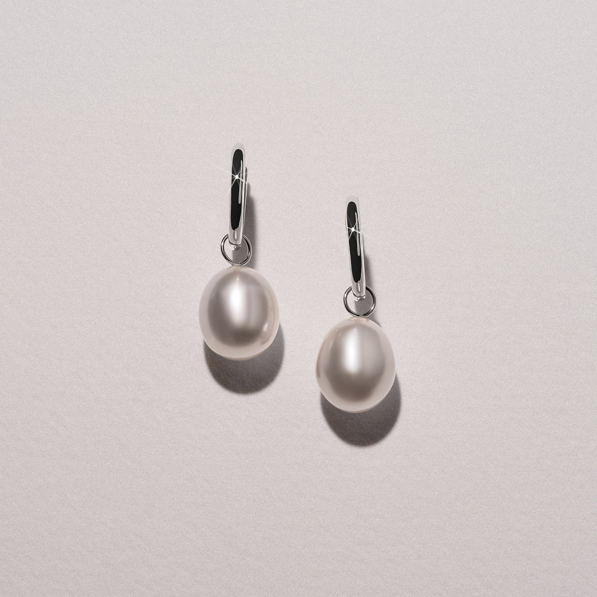 Eden 11mm and 13mm Oval Pearl Huggie Earrings in Sterling Silver