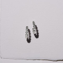 Solis 0.25ct Round Cut Lab Diamond Huggie Earrings in Sterling Silver