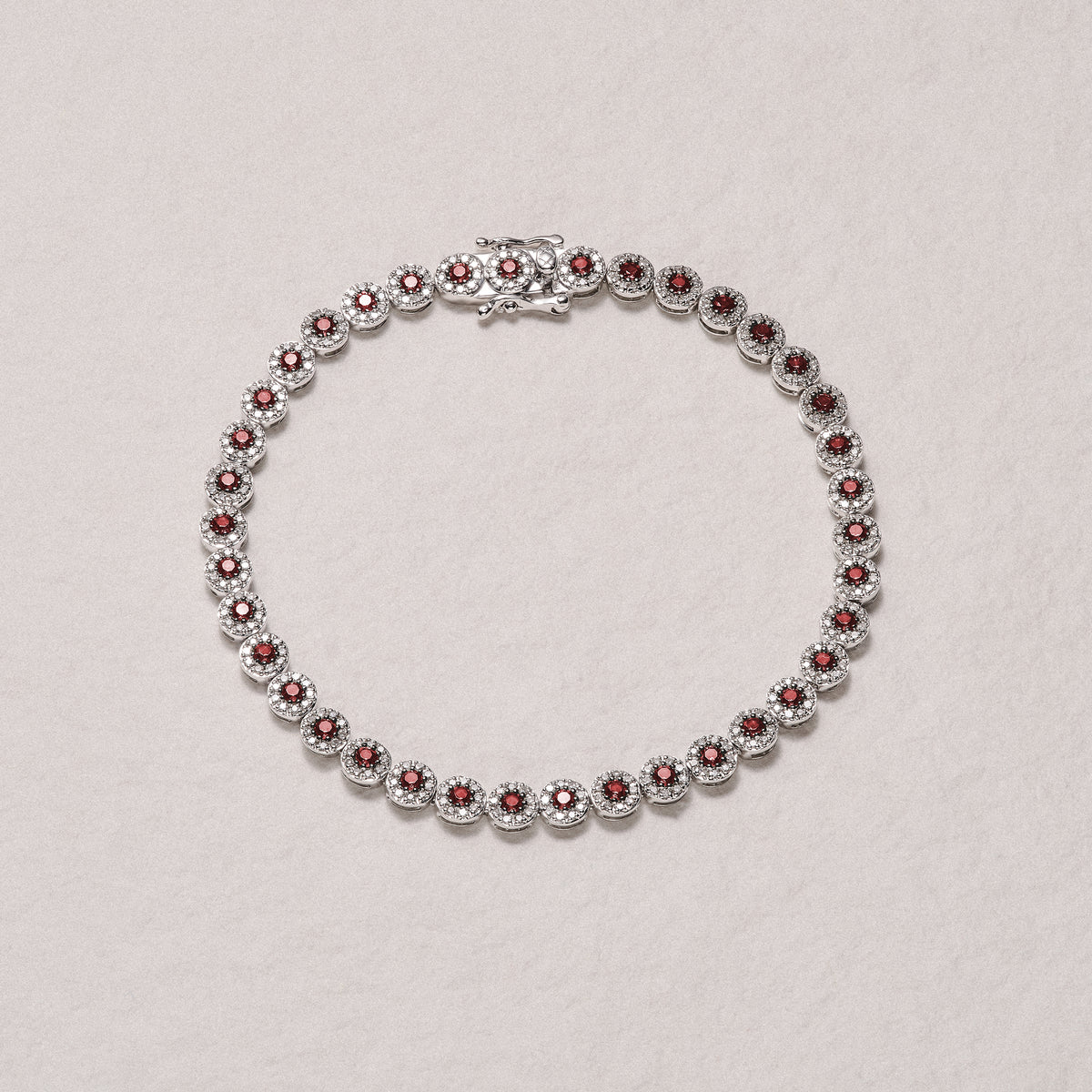 Stellato 1.50ct Round Cut Lab Ruby Halo Tennis Bracelet in Sterling Silver