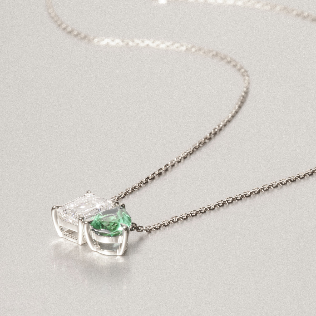 Toi Et Moi 1.50ct Emerald Cut Lab Diamond and 1.30ct Pear Lab Emerald Necklace in 18K White Gold