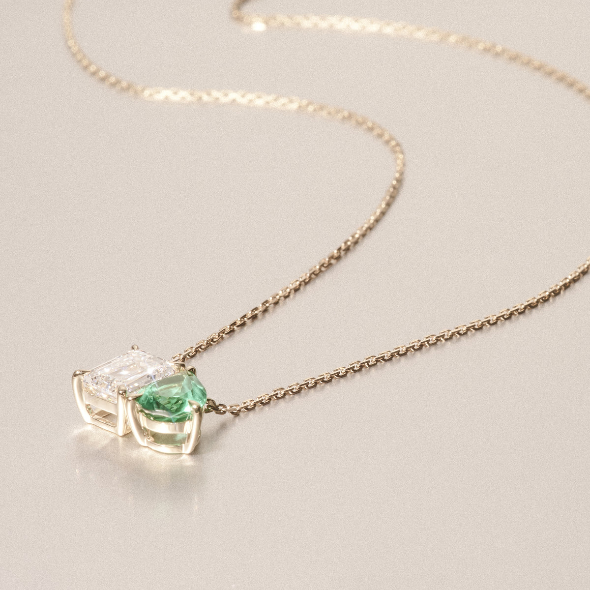 Toi Et Moi 1.50ct Emerald Cut Lab Diamond and 1.30ct Pear Lab Emerald Necklace in 18K Yellow Gold