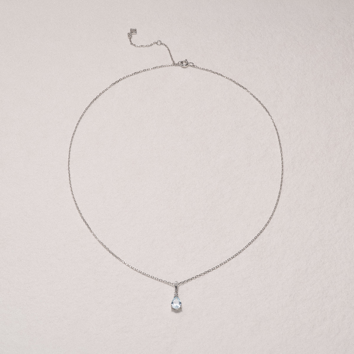 Stellato 0.85ct Pear Cut Blue Topaz and Lab Diamond Pendant Necklace in Sterling Silver