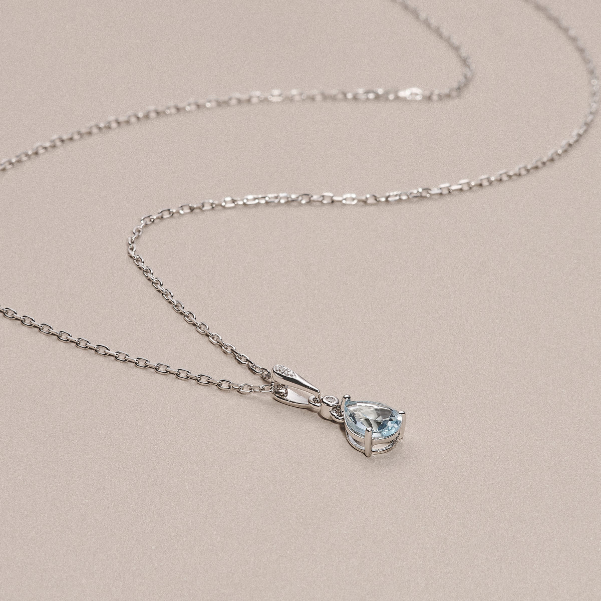 Stellato 0.85ct Pear Cut Blue Topaz and Lab Diamond Pendant Necklace in Sterling Silver