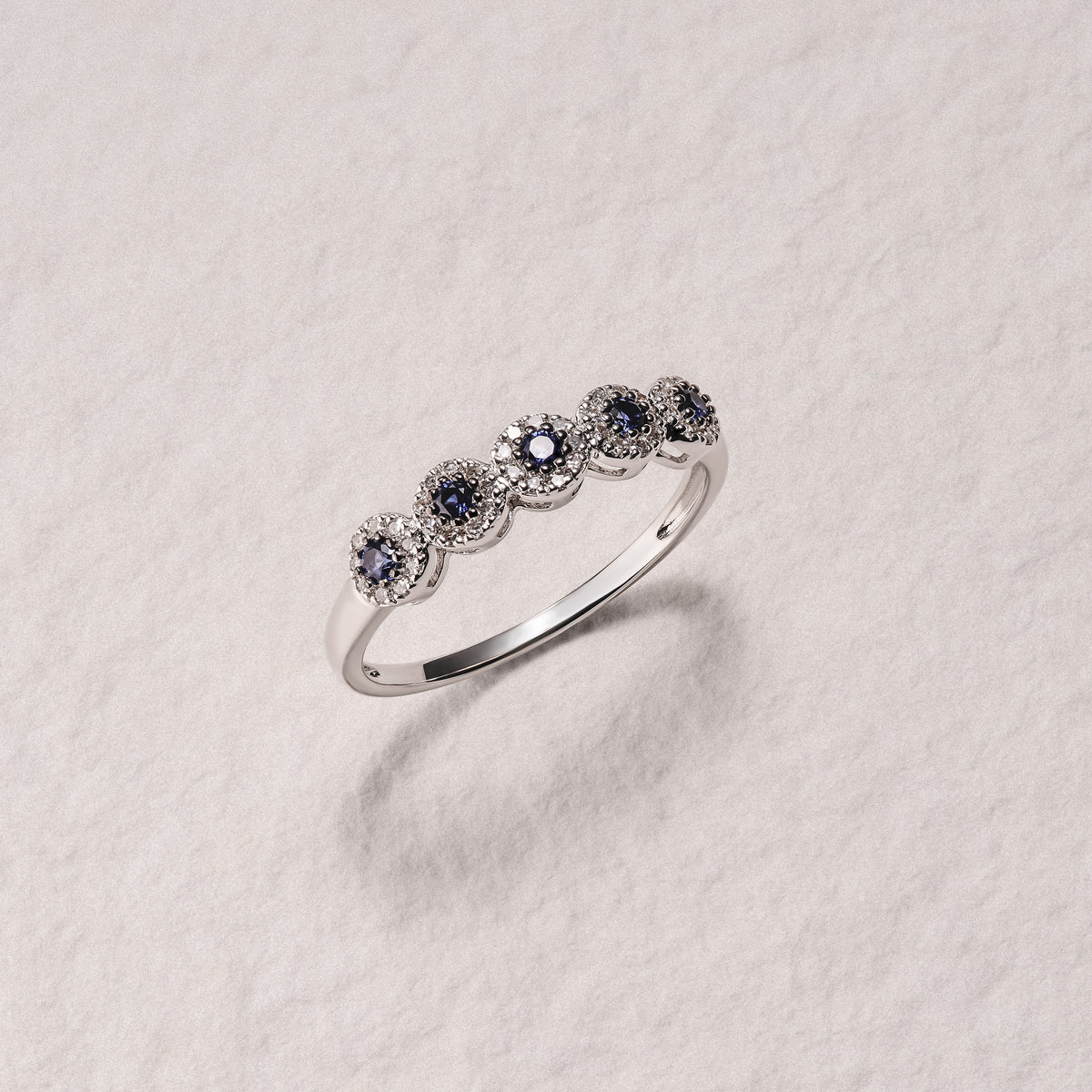 Stellato 0.20ct Round Cut Lab Sapphire Halo Half Eternity Ring in Sterling Silver