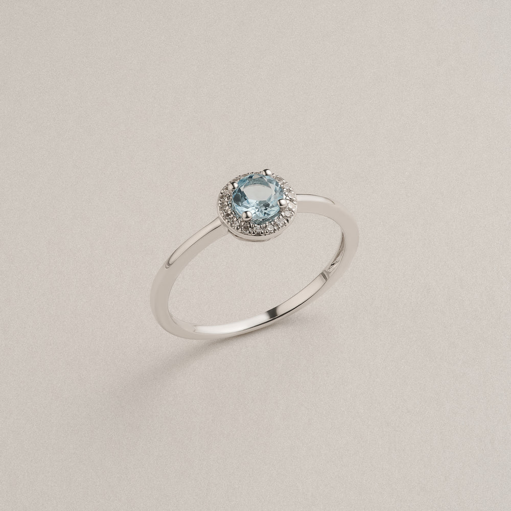 Stellato 0.40ct Round Cut Blue Topaz and Lab Diamond Halo Ring in Sterling Silver