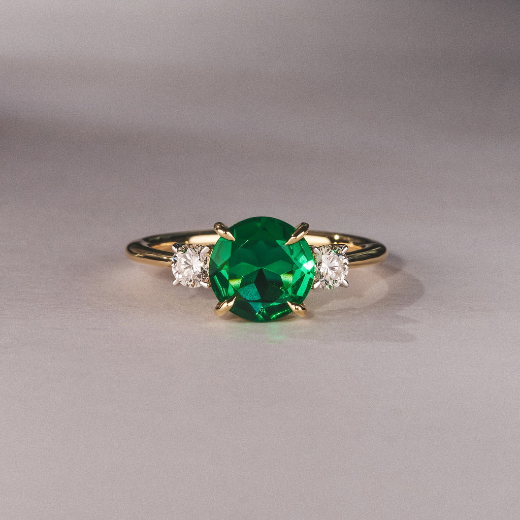 Solene 2.00ct Round Cut Lab Emerald and Lab Diamond 3 Stone Engagement Ring in 18K Yellow Gold