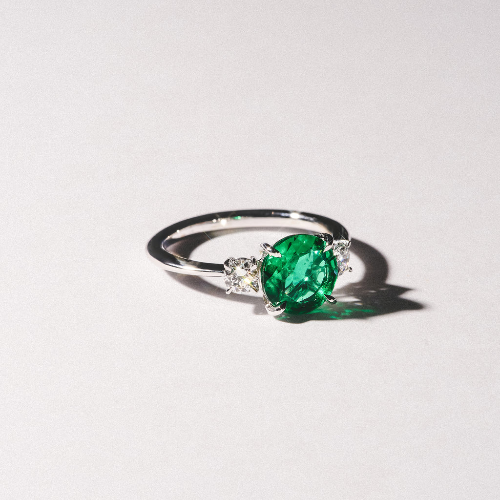 Solene 2.00ct Round Cut Lab Emerald and Lab Diamond 3 Stone Engagement Ring in 18K White Gold