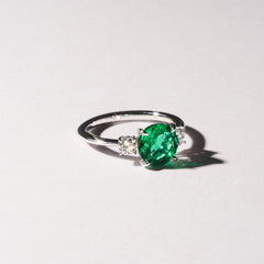 Solene 2.00ct Round Cut Lab Emerald and Lab Diamond 3 Stone Engagement Ring in 18K White Gold
