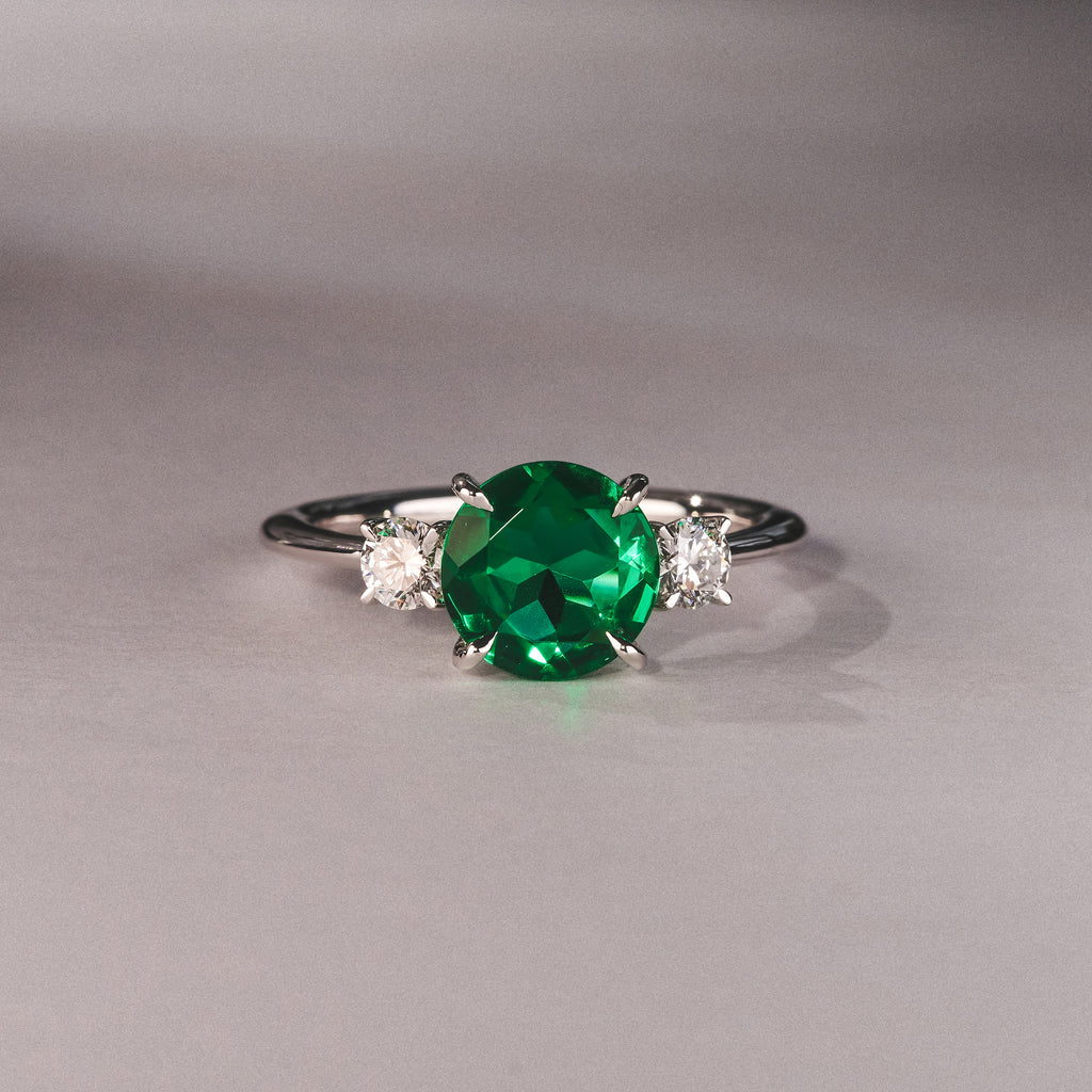 Solene 2.00ct Round Cut Lab Emerald and Lab Diamond 3 Stone Engagement Ring in 18K White Gold