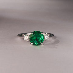 Solene 2.00ct Round Cut Lab Emerald and Lab Diamond 3 Stone Engagement Ring in 18K White Gold