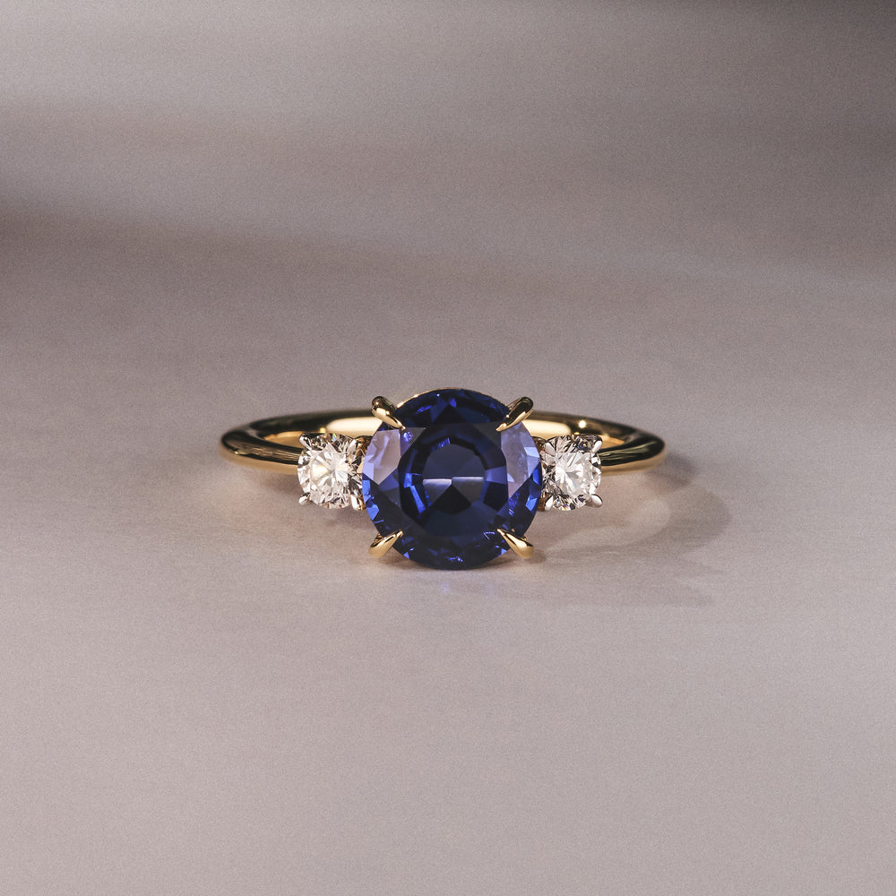 Solene 2.00ct Round Cut Lab Sapphire and Lab Diamond 3 Stone Engagement Ring in 18K Yellow Gold