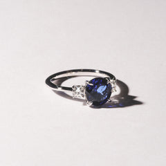 Solene 2.00ct Round Cut Lab Sapphire and Lab Diamond 3 Stone Engagement Ring in 18K White Gold
