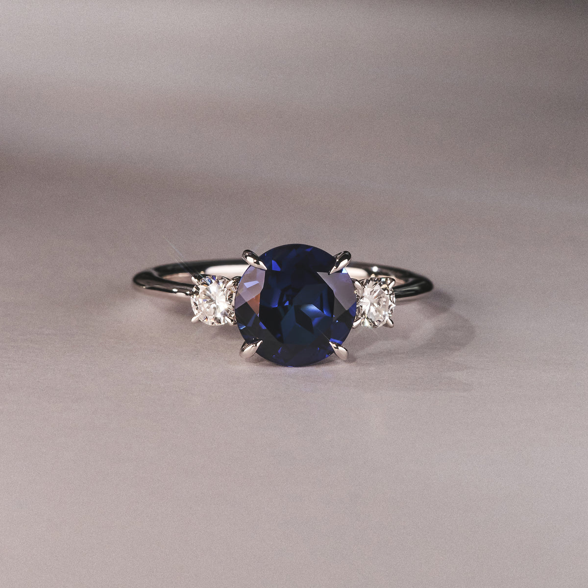 Solene 2.00ct Round Cut Lab Sapphire and Lab Diamond 3 Stone Engagement Ring in 18K White Gold
