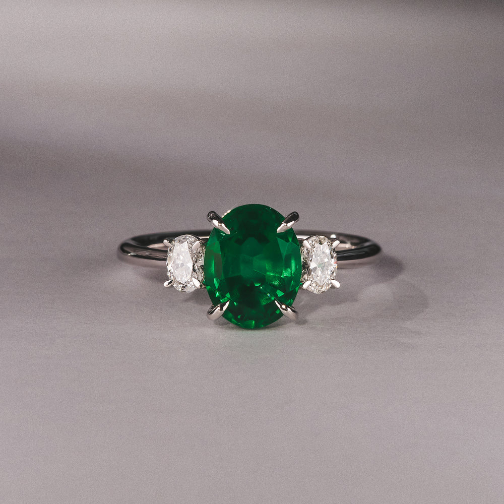 Solene 2.00ct Oval Cut Lab Emerald and Lab Diamond 3 Stone Engagement Ring in 18K White Gold