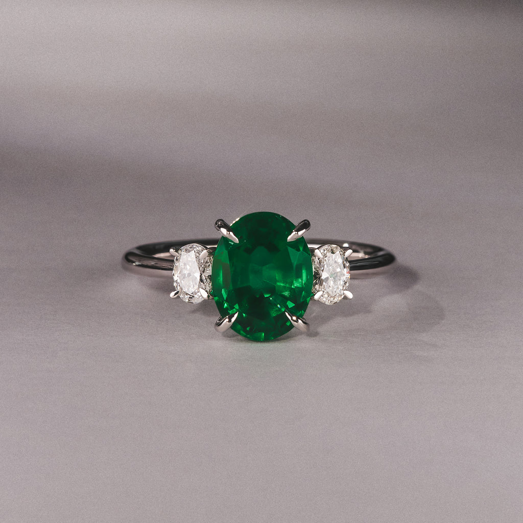 Solene 2.00ct Oval Cut Lab Emerald and Lab Diamond 3 Stone Engagement Ring in 18K White Gold