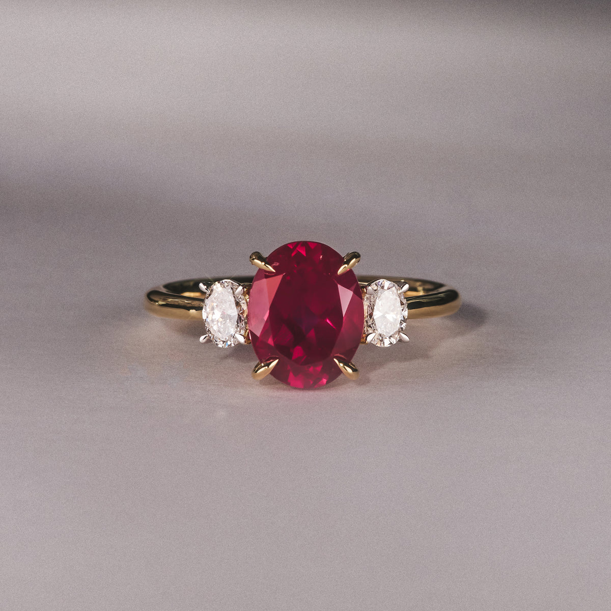 Solene 2.00ct Oval Cut Lab Ruby and Lab Diamond 3 Stone Engagement Ring in 18K Yellow Gold