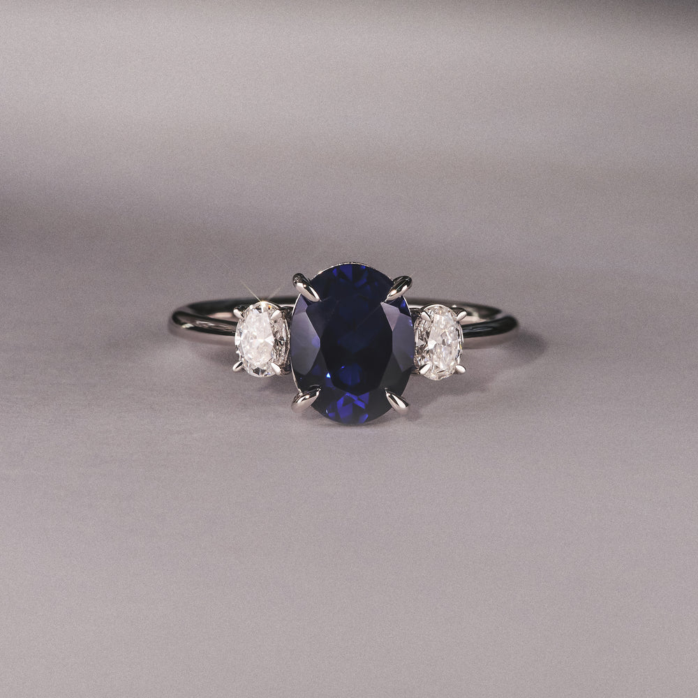 Solene 2.00ct Oval Cut Lab Sapphire and Lab Diamond  3 Stone Engament Ring in 18K White Gold