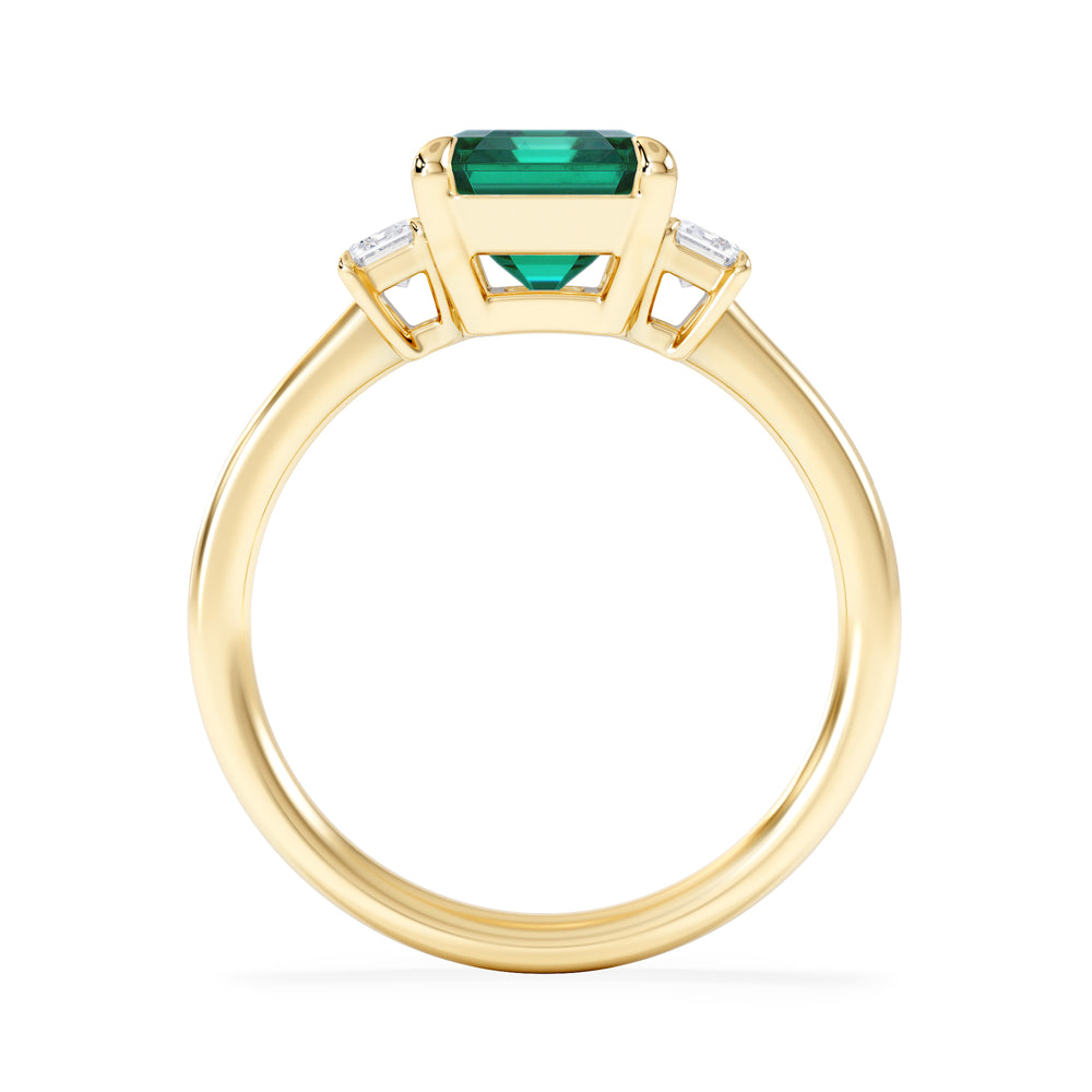 Solene 2.50ct Emerald Cut Lab Emerald and Lab Diamond 3 Stone Engagement Ring in 18K Yellow Gold