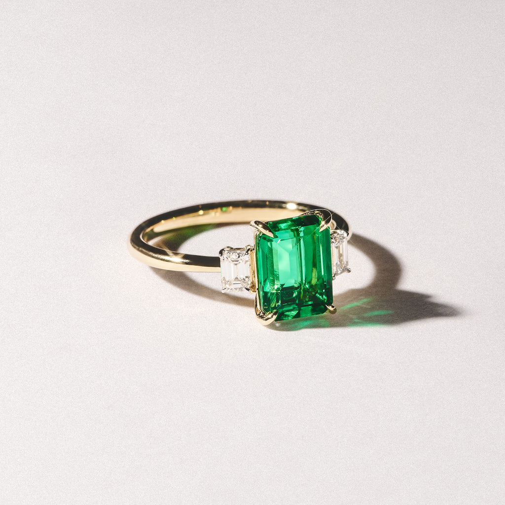 Solene 2.50ct Emerald Cut Lab Emerald and Lab Diamond 3 Stone Engagement Ring in 18K Yellow Gold