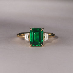 Solene 2.50ct Emerald Cut Lab Emerald and Lab Diamond 3 Stone Engagement Ring in 18K Yellow Gold