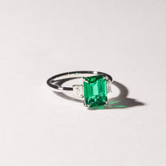 Solene 2.50ct Emerald Cut Lab Emerald and Lab Diamond 3 Stone Engagement Ring in 18K White Gold
