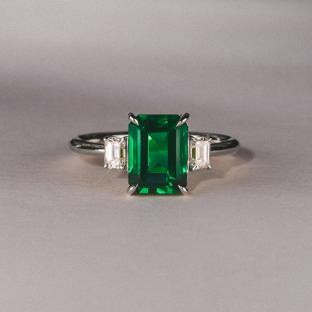 Solene 2.50ct Emerald Cut Lab Emerald and Lab Diamond 3 Stone Engagement Ring in 18K White Gold