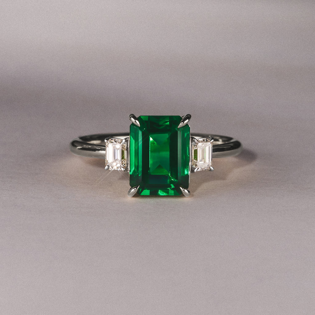 Solene 2.50ct Emerald Cut Lab Emerald and Lab Diamond 3 Stone Engagement Ring in 18K White Gold