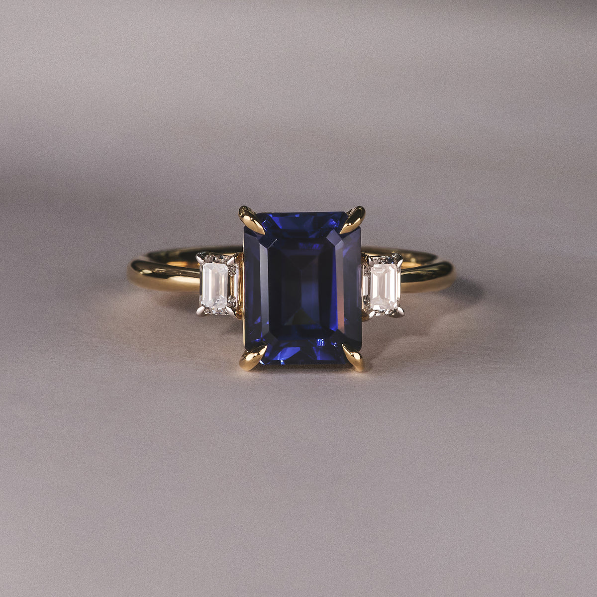 Solene 2.50ct Emerald Cut Lab Sapphire and Lab Diamond 3 Stone Engament Ring in 18K Yellow Gold