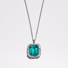 7.00ct Emerald Cut Lab Paraíba YAG Halo Pendant Necklace in 14K White Gold