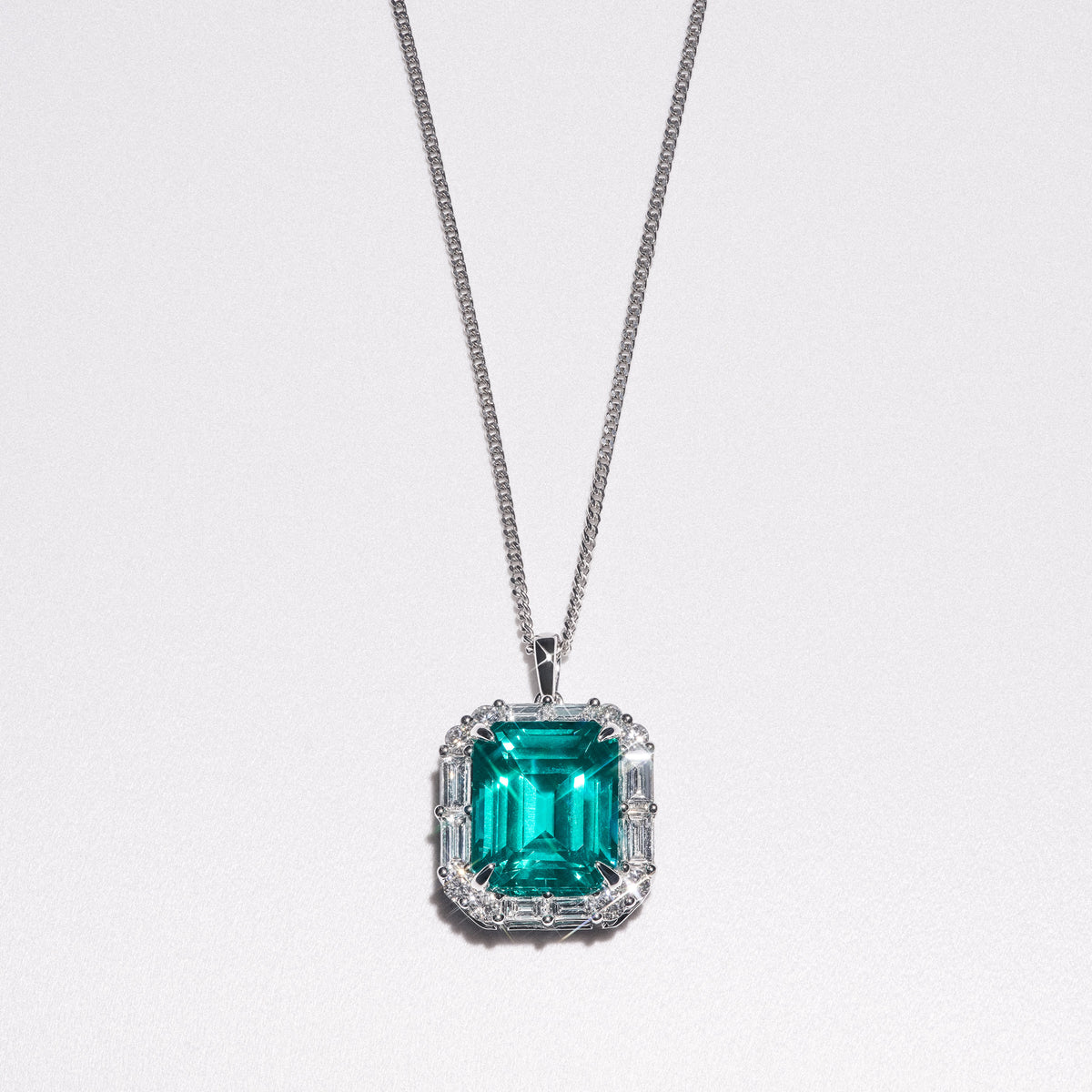 7.00ct Emerald Cut Lab Paraíba YAG Halo Pendant Necklace in 14K White Gold