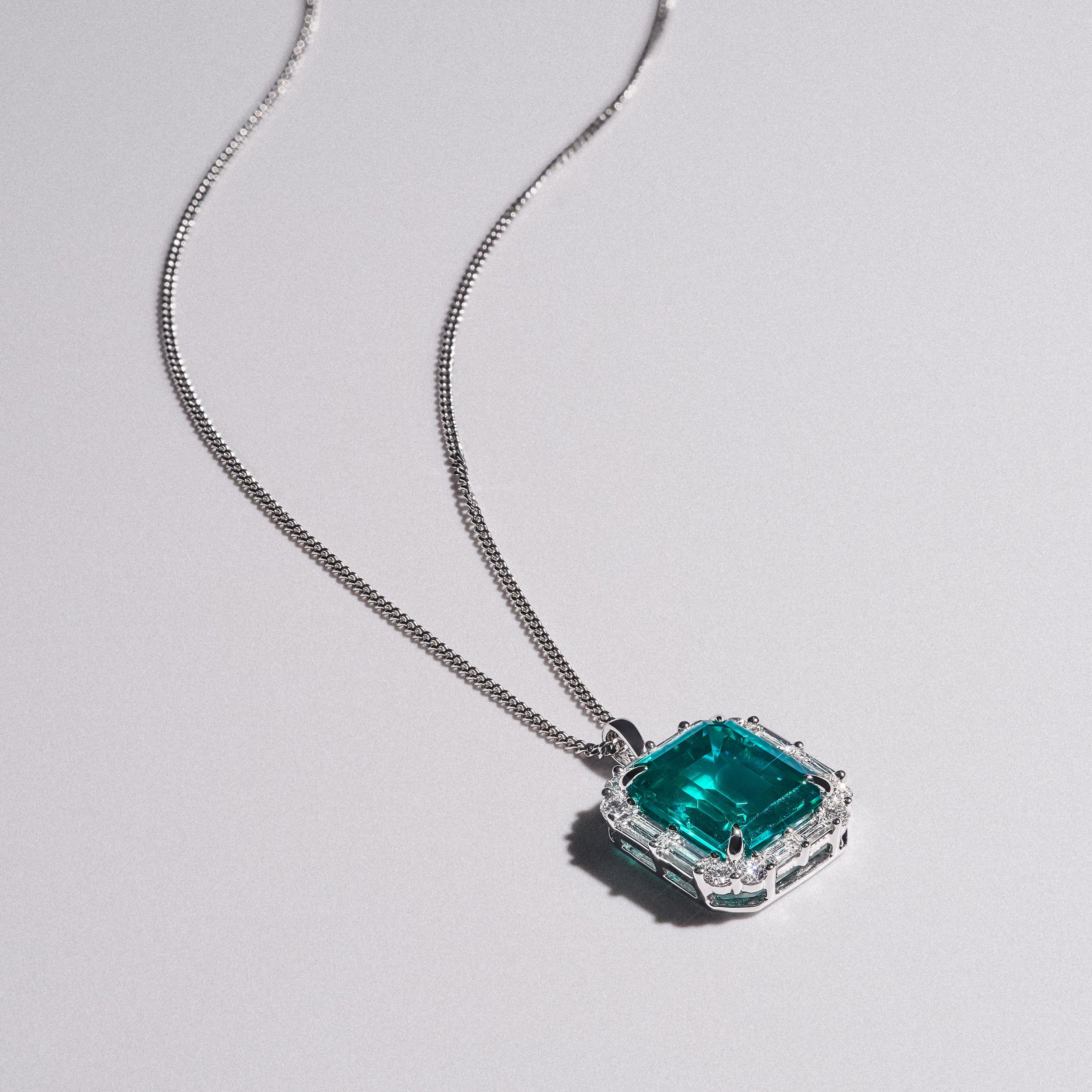 7.00ct Emerald Cut Lab Paraíba YAG Halo Pendant Necklace in 14K White Gold