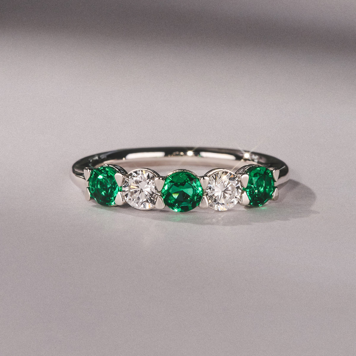 Solene 0.75ct Round Cut Lab Emerald and  Lab Diamond Half Eternity Ring in 18K White Gold