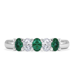 Solene 0.75ct Oval Cut Lab Emerald and Lab Diamond Half Band Eternity Ring in 18K White Gold