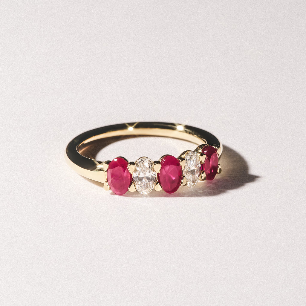 Solene 0.75ct Oval Cut Lab Ruby and Lab Diamond Half Band Eternity Ring in 18K Yellow Gold