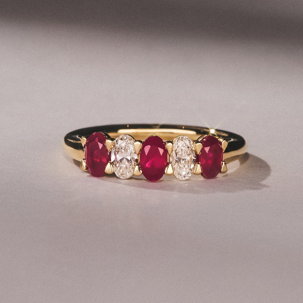 Solene 0.75ct Oval Cut Lab Ruby and Lab Diamond Half Band Eternity Ring in 18K Yellow Gold