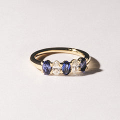 Solene 0.75ct Oval Cut Lab Sapphire and Lab Diamond Half Band Eternity Ring in 18k Yellow Gold