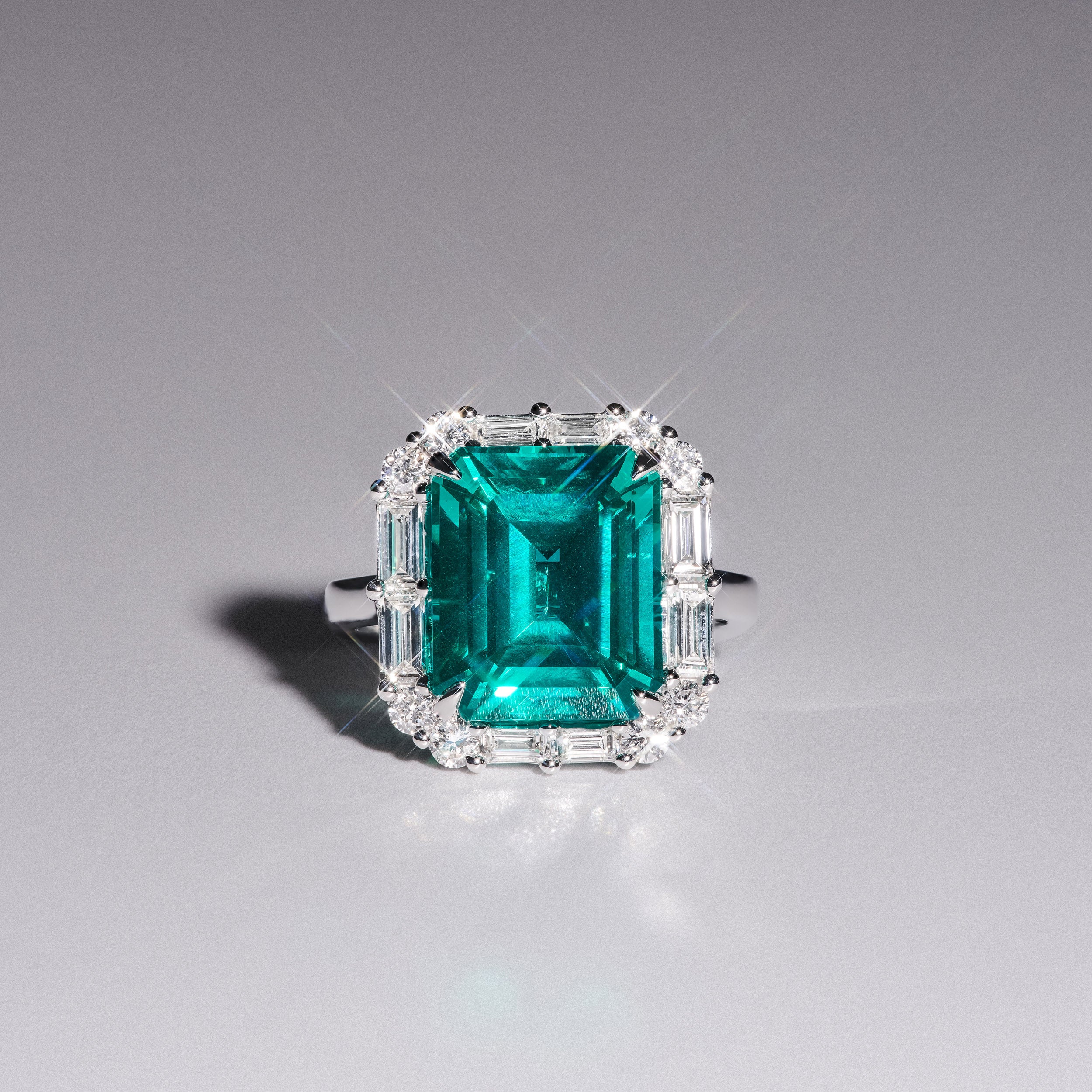 7.00ct Emerald Cut Lab Paraíba YAG Halo Ring in 14K White Gold