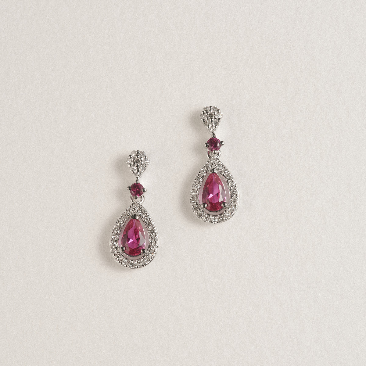 Stellato 0.55ct Pear Cut Lab Ruby Halo Drop Earrings in Sterling Silver