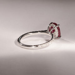 Amora Gem 2.00ct Oval Cut Lab Ruby Hidden Halo Engagement Ring with Side Stones in 18K White Gold