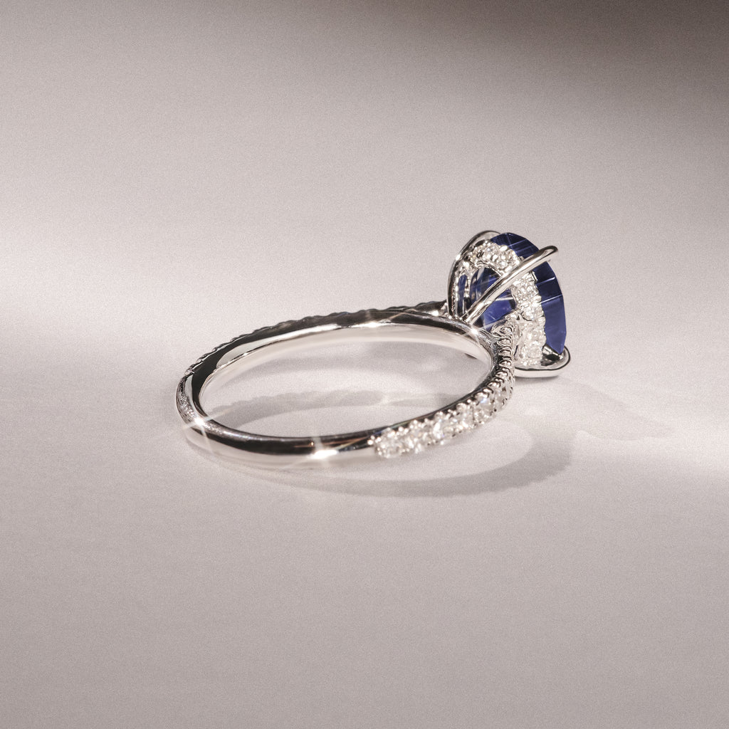 Amora Gem 2.00ct Oval Cut Lab Sapphire Hidden Halo Engagement Ring with Side Stones in 18K White Gold