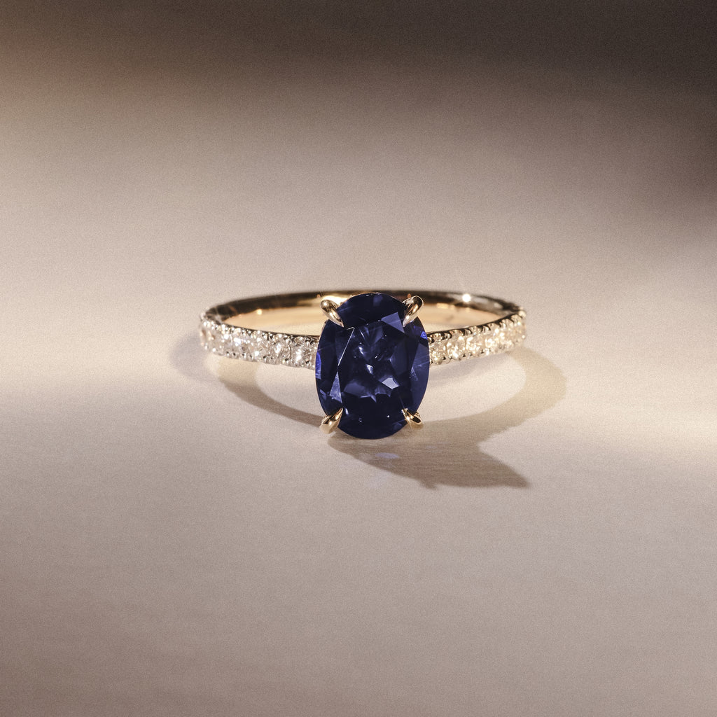 Amora Gem 2.00ct Oval Cut Lab Sapphire Hidden Halo Engagement Ring with Side Stones in 18K Yellow Gold
