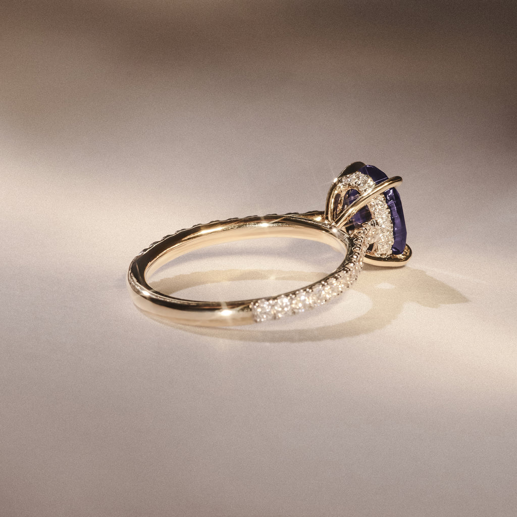 Amora Gem 2.00ct Oval Cut Lab Sapphire Hidden Halo Engagement Ring with Side Stones in 18K Yellow Gold