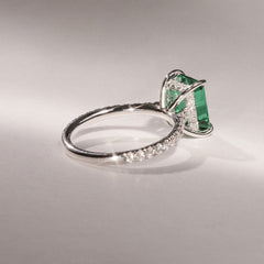 Amora Gem 2.50ct Emerald Cut Lab Emerald Hidden Halo Engagement Ring with Side Stones in 18K White Gold