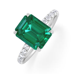 Amora Gem 2.50ct Emerald Cut Lab Emerald Hidden Halo Engagement Ring with Side Stones in 18K White Gold