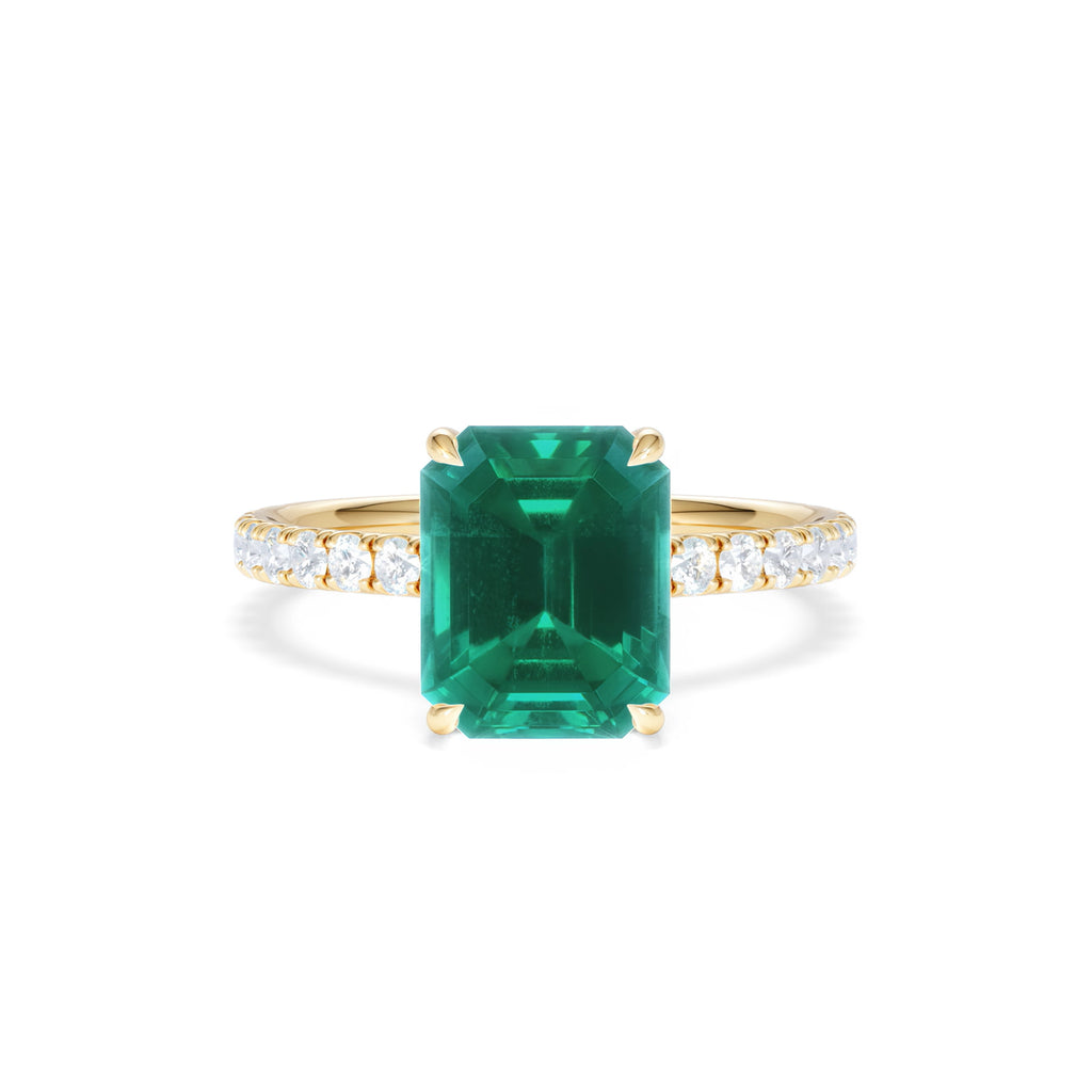 Amora 2.00ct Emerald Cut Lab Emerald Hidden Halo Engagement Ring with Side Stones in 18K Yellow Gold