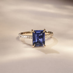 Amora Gem 2.50ct Emerald Cut Lab Sapphire Hidden Halo Engagement Ring with Side Stones in 18K Yellow Gold