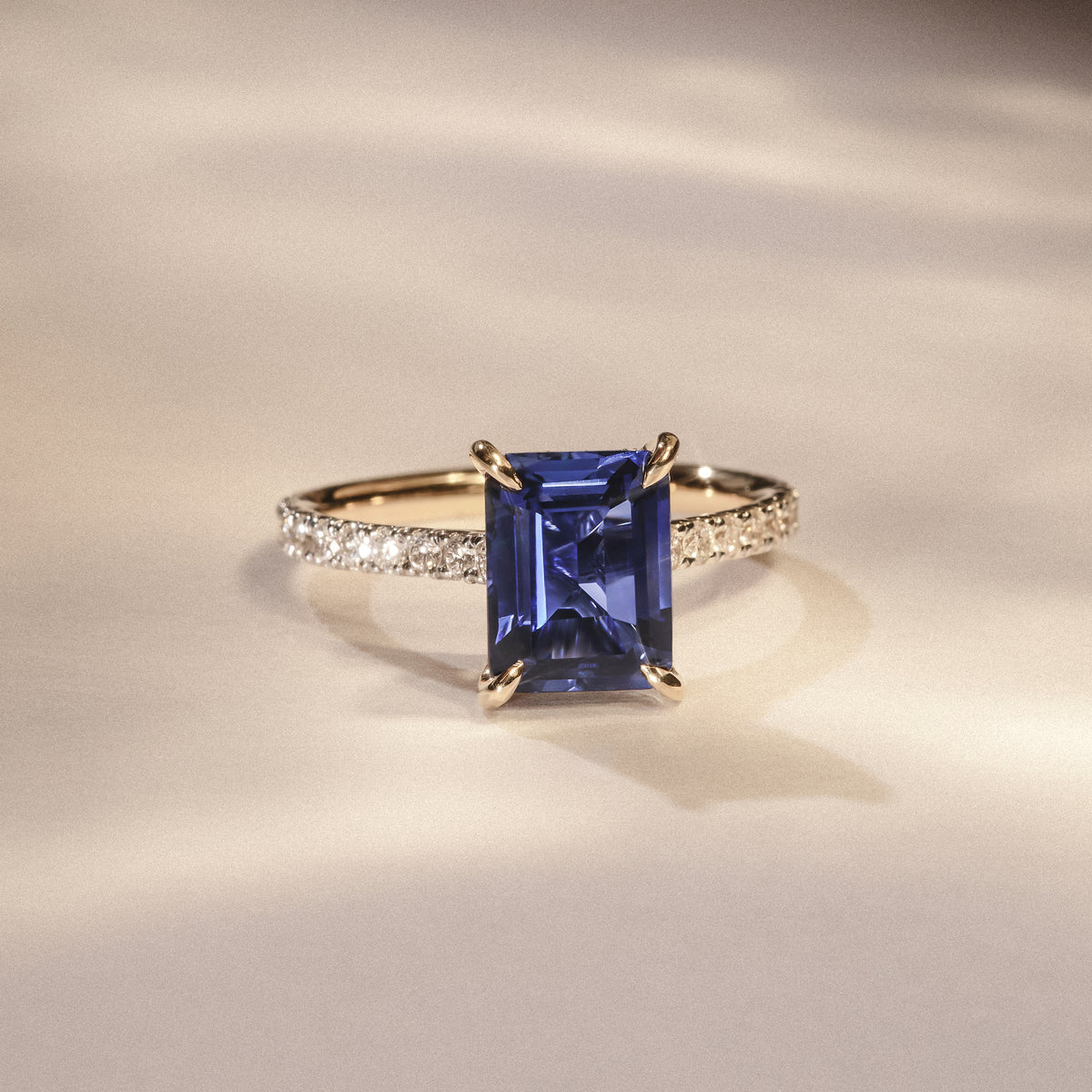 Amora Gem 2.50ct Emerald Cut Lab Sapphire Hidden Halo Engagement Ring with Side Stones in 18K Yellow Gold