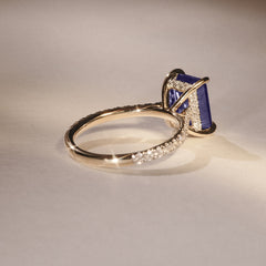 Amora Gem 2.50ct Emerald Cut Lab Sapphire Hidden Halo Engagement Ring with Side Stones in 18K Yellow Gold
