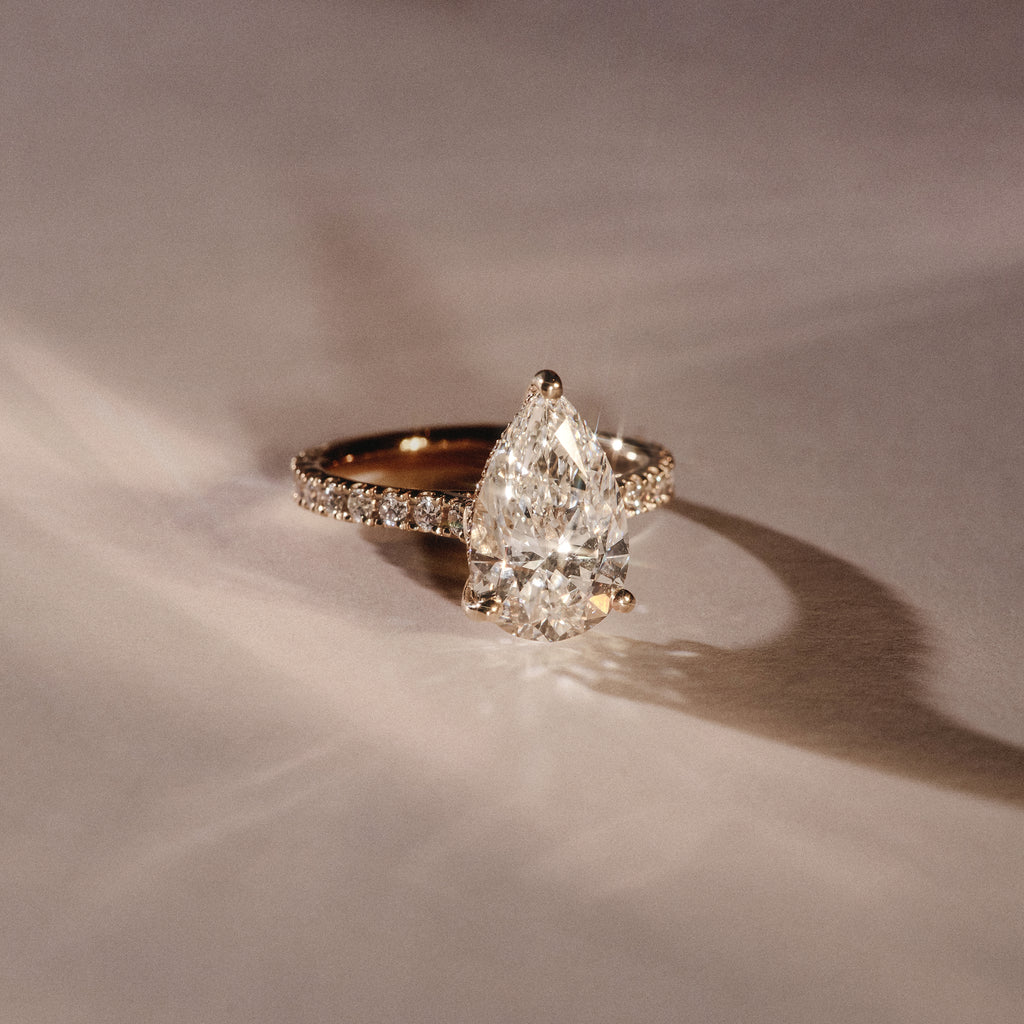 Amora Pear 3.36ct Hidden Halo Lab Diamond Engagement Ring With Side Stones Set in 18K Gold